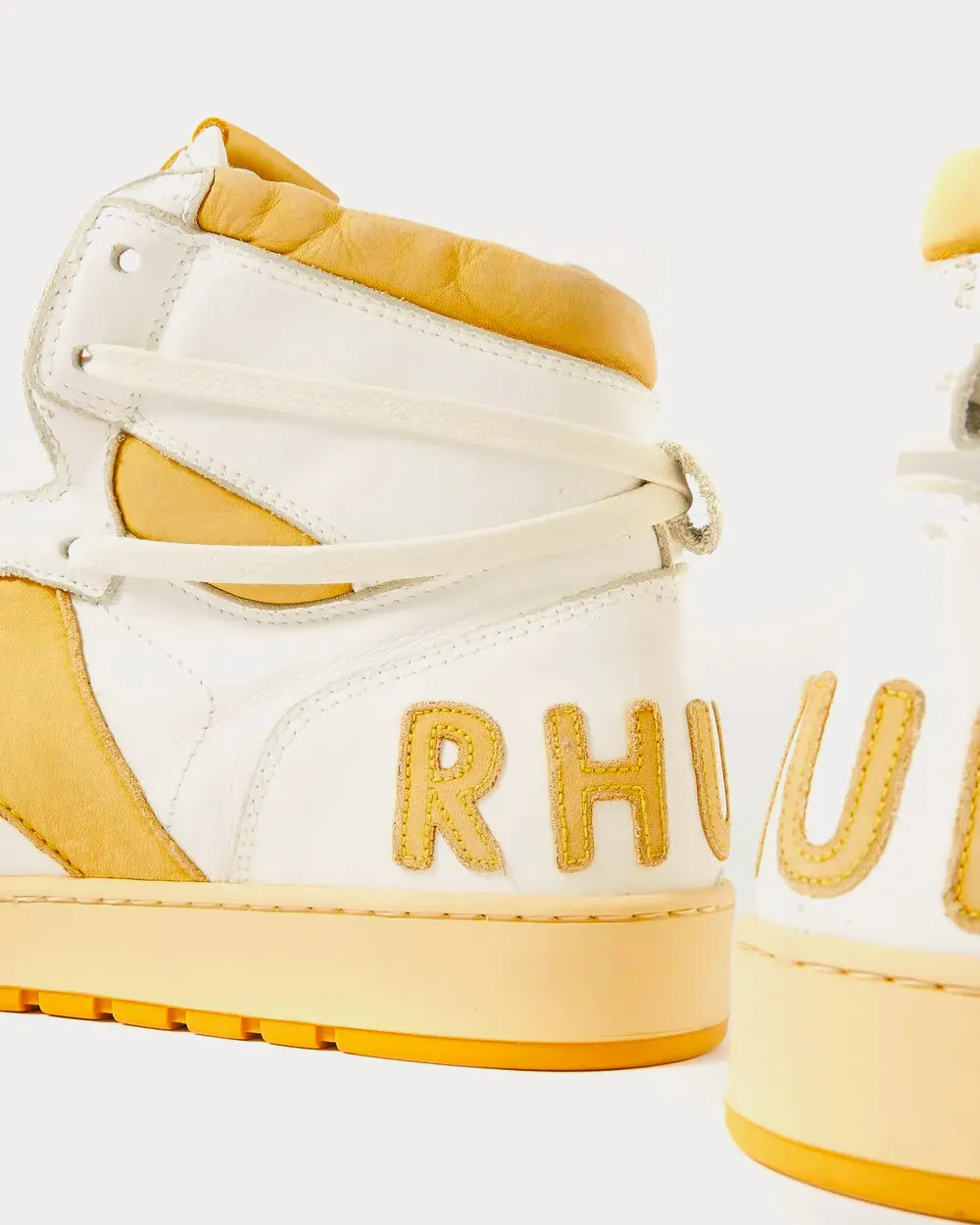 Rhecess Distressed Leather Yellow High Top Sneakers